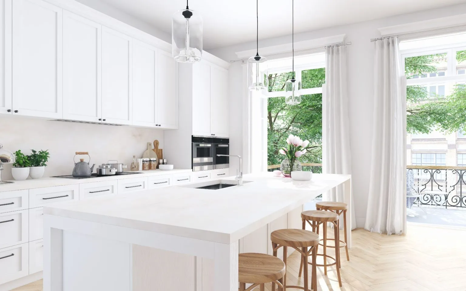 Elegant white kitchen with wooden floors and cabinets, highlighting a recent remodeling effort for a fresh look.