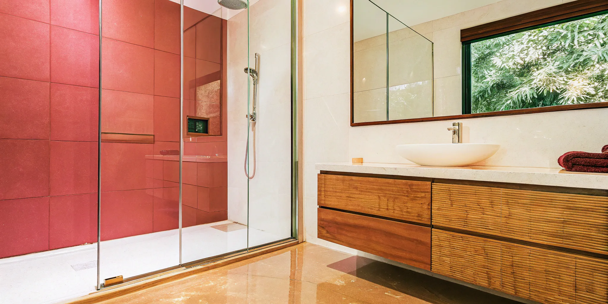 Small modern bathroom idea featuring a floating vanity and glass shower to maximize light and space.