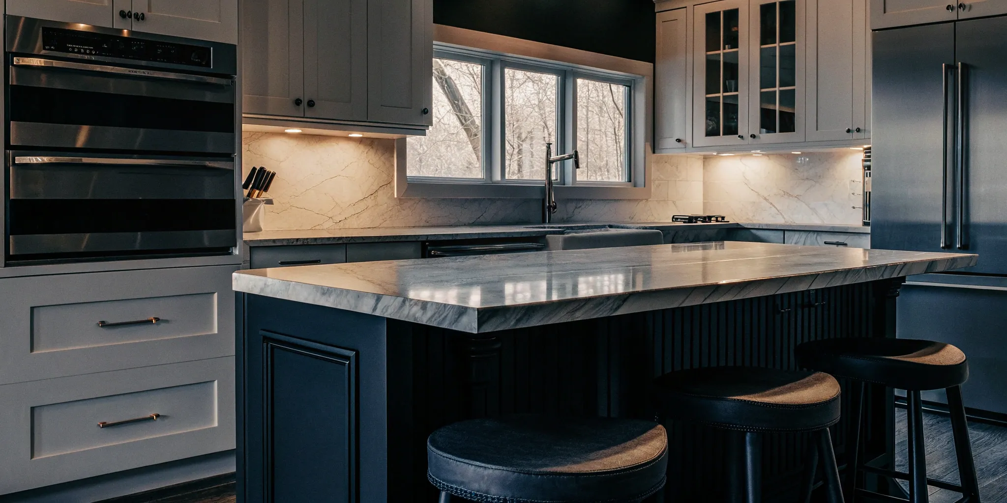 How much a 10x10 kitchen remodel costs with a marble island, shaker cabinets, and stainless steel appliances.