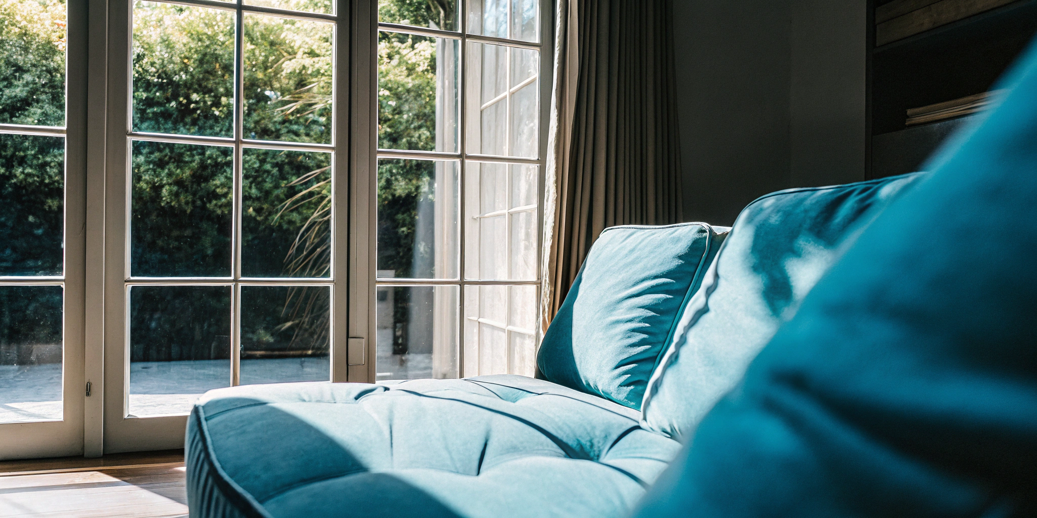 Professional energy efficient window installation in a bright, modern living room.